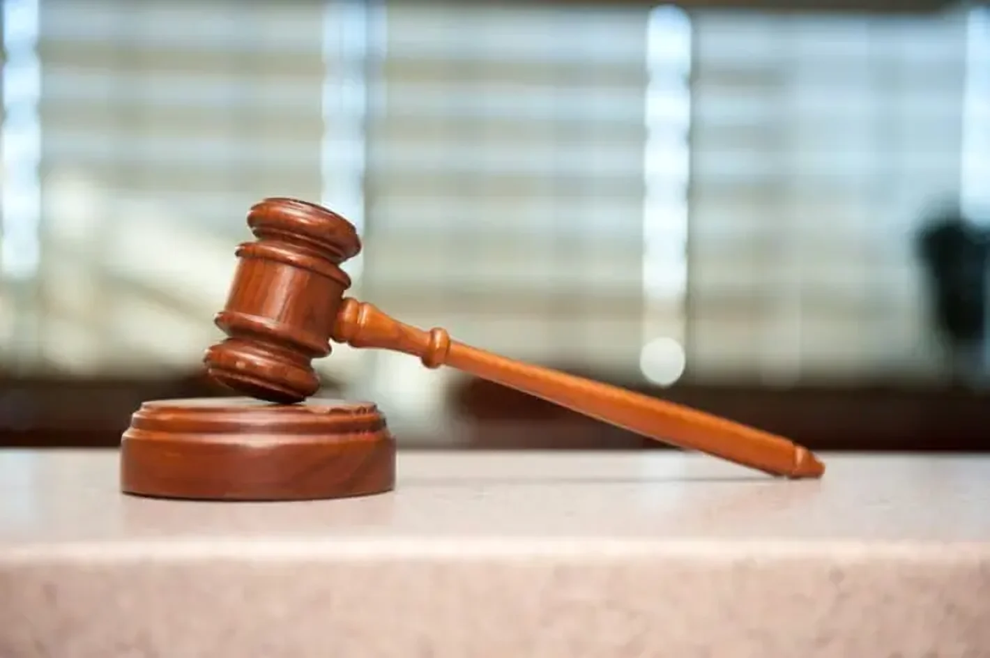 Wooden judge’s gavel, symbol of civil liability